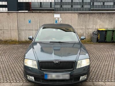 Używany Skoda Octavia 105 KM (77 kW) 2004 Szary Sedan/Limuzyna