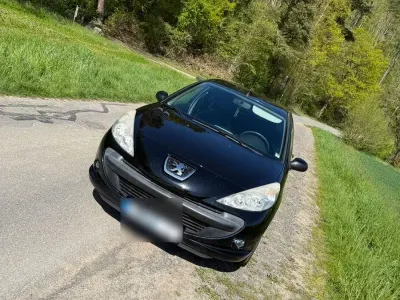 Gebraucht Peugeot 206 73 PS (53 kW) 2010 Schwarz Kleinwagen