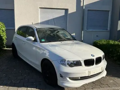 Second-hand BMW 116 Performance 122 CP (89 kW) 2009 Alb Hatchback