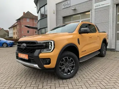 Gebraucht Ford Ranger Wildtrack 205 PS (150 kW) 2024 Cyber orange 3c (metallic) Pickup