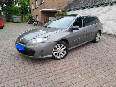 Używany Renault Laguna III 150 KM (110 kW) 2010 Brązowy Kombi