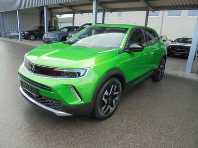Gebraucht Opel Mokka Elegance 131 PS (96 kW) 2021 Matcha green/ikone gruen SUV