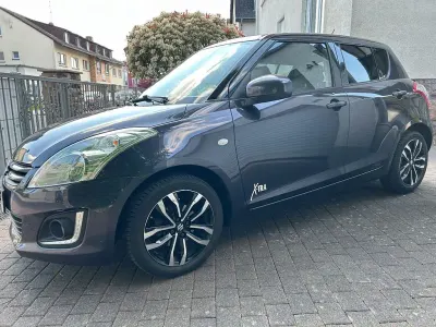 Gebraucht Suzuki Swift X-TRA 94 PS (69 kW) 2015 Grau Kleinwagen