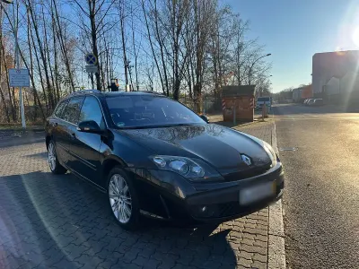 Używany Renault Laguna III 163 KM (119 kW) 2011 Czarny Kombi