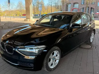Gebraucht BMW 116 Sport Line 136 PS (100 kW) 2012 Schwarz Kleinwagen