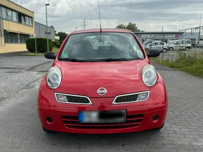 Gebraucht Nissan Micra 65 PS (47 kW) 2009 Rot Kleinwagen