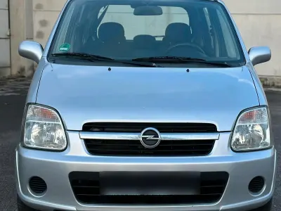 Używany Opel Agila 60 KM (44 kW) 2004 Srebrny Minivan