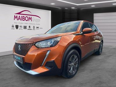 Second-hand Peugeot e-2008 Active 100 kW (136 CP) 2021 Portocaliu SUV