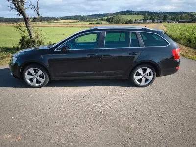 Używany Skoda Octavia Elegance 179 KM (131 kW) 2013 Czarny Kombi