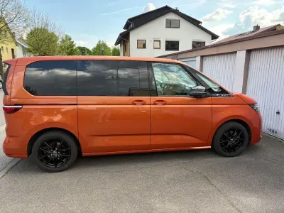 Gebraucht VW Multivan 150 PS (110 kW) 2024 Orange Van / Kleinbus