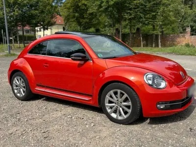 Używany VW Beetle CLUB 105 KM (77 kW) 2015 Pomarańczowy Hatchback