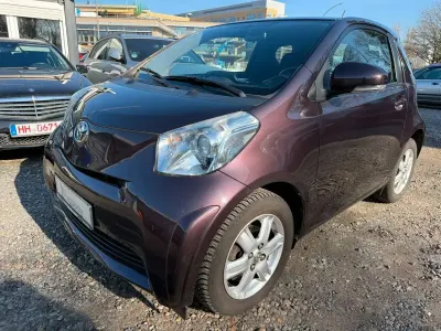 Używany Toyota iQ 68 KM (50 kW) 2009 Purpurowy Hatchback