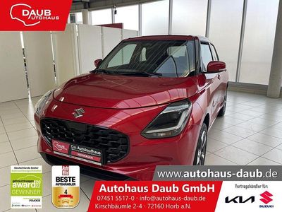Burning red pearl metallic Neu 2025 Suzuki Swift Comfort+ Limousine | 19.990 €