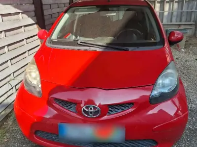 Gebraucht Toyota Aygo 68 PS (50 kW) 2007 Rot Kleinwagen