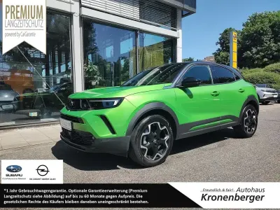 Gebraucht Opel Mokka Ultimate 131 PS (96 kW) 2024 Lackierung matcha green/typ aussenverkleidung metalliclackierung SUV