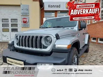 Gebraucht Jeep Wrangler Unlimited Sahara 272 PS (200 kW) 2024 Silber SUV