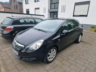 Używany Opel Corsa Edition 69 KM (50 kW) 2010 Czarny Hatchback