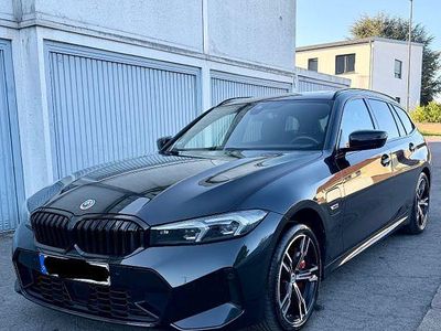 Second-hand BMW 330e M Sport 292 CP (214 kW) 2022 Negru Break