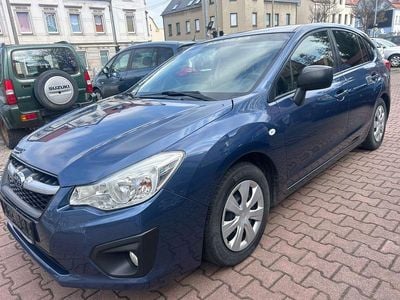 Second-hand Subaru Impreza Active 114 CP (83 kW) 2014 Albastru Berlinǎ