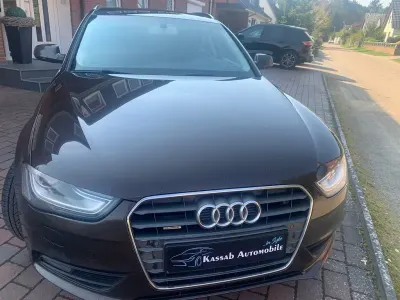 Używany Audi A4 Ambition 150 KM (110 kW) 2014 Brązowy Kombi