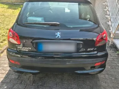 Gebraucht Peugeot 206+ 77 PS (56 kW) 2009 Grau Kleinwagen
