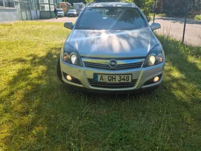 Używany Opel Astra 115 KM (84 kW) 2009 Srebrny Kombi