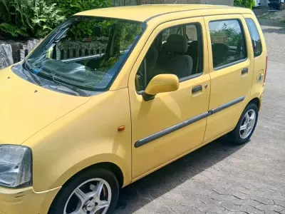 Gebraucht Opel Agila 60 PS (44 kW) 2002 Gelb Van / Kleinbus