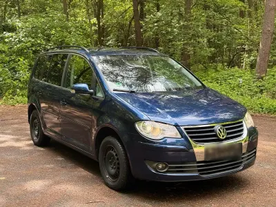 Używany VW Touran 105 KM (77 kW) 2006 Niebieski Minivan