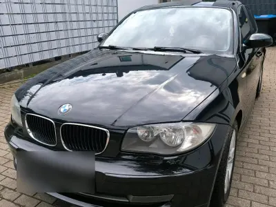 Gebraucht BMW 116 114 PS (83 kW) 2009 Schwarz Kleinwagen