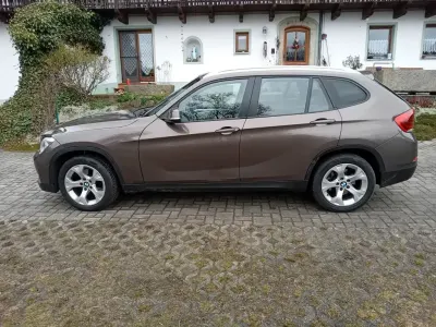 Używany BMW X1 184 KM (135 kW) 2012 Brązowy SUV