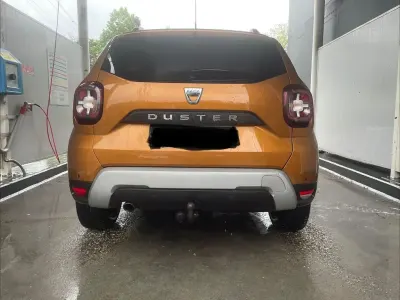 Używany Dacia Duster Prestige 116 KM (85 kW) 2019 Pomarańczowy SUV