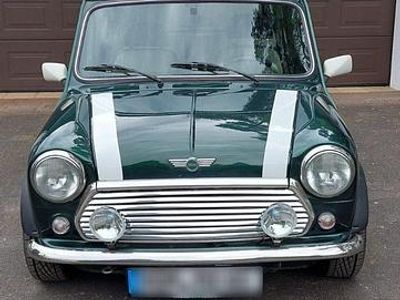 Begagnad Mini 1300 63 HK (46 kW) 1999 Grön Halvkombi