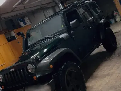Gebraucht Jeep Wrangler Unlimited Rubicon 200 PS (147 kW) 2013 Schwarz SUV