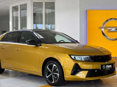 Gebraucht Opel Astra 131 PS (96 kW) 2025 Lackierung amber yellow/ Kleinwagen