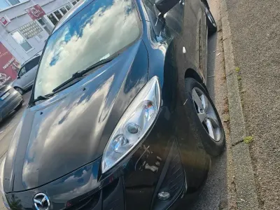 Gebraucht Mazda 5 116 PS (85 kW) 2011 Schwarz Van / Kleinbus