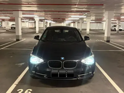 Gebraucht BMW 118 Sport Line 170 PS (125 kW) 2011 Schwarz Kleinwagen