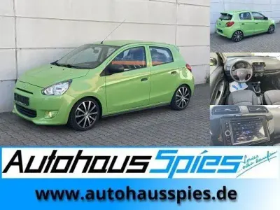 Gebraucht Mitsubishi Space Star 71 PS (52 kW) 2013 Grün Van / Kleinbus