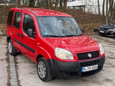 Second-hand Fiat Doblò Emotion 77 CP (56 kW) 2009 Roșu Monovolum