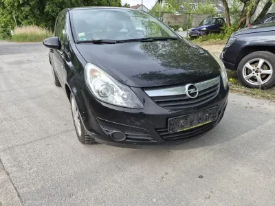 Używany Opel Corsa Edition 80 KM (58 kW) 2009 Czarny Hatchback