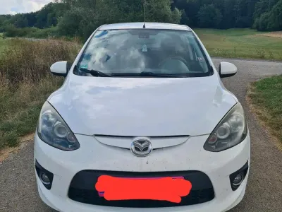 Gebraucht Mazda 2 75 PS (55 kW) 2009 Weiß Kleinwagen