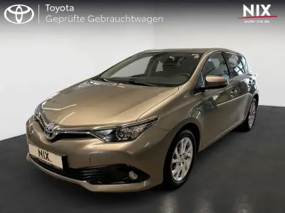Gebraucht Toyota Auris Hybrid Basis 136 PS (100 kW) 2016 Avantgarde bronze metallic Limousine