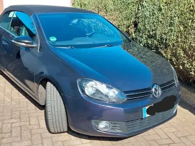 Używany VW Golf 105 KM (77 kW) 2011 Purpurowy Kabriolet