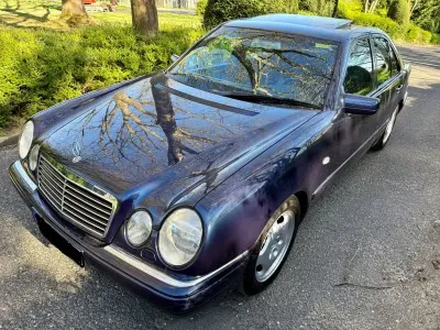 Second-hand Mercedes E230 150 CP (110 kW) 1996 Albastru Berlinǎ