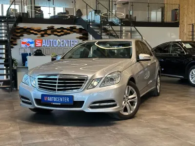 Używany Mercedes E200 184 KM (135 kW) 2011 Srebrny Sedan/Limuzyna