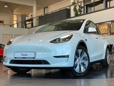 Second-hand Tesla Model Y Long Range AWD 378 kW (514 CP) 2023 Alb SUV