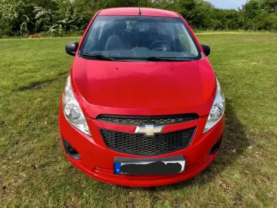 Second-hand Chevrolet Spark 63 CP (46 kW) 2012 Roșu Hatchback