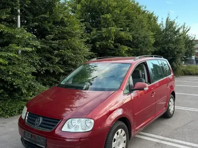 Gebraucht VW Touran 114 PS (83 kW) 2004 Rot Van / Kleinbus