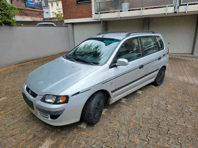 Gebraucht Mitsubishi Space Star 98 PS (72 kW) 2003 Silber Van / Kleinbus