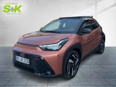 Gebraucht Toyota Aygo X Lounge 117 PS (86 kW) 2026 Cinnamon (4t4)/ black mica (209) (orange) SUV