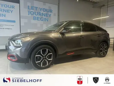 Gebraucht Citroën e-C4 Shine 100 kW (136 PS) 2022 Platinium grau Limousine